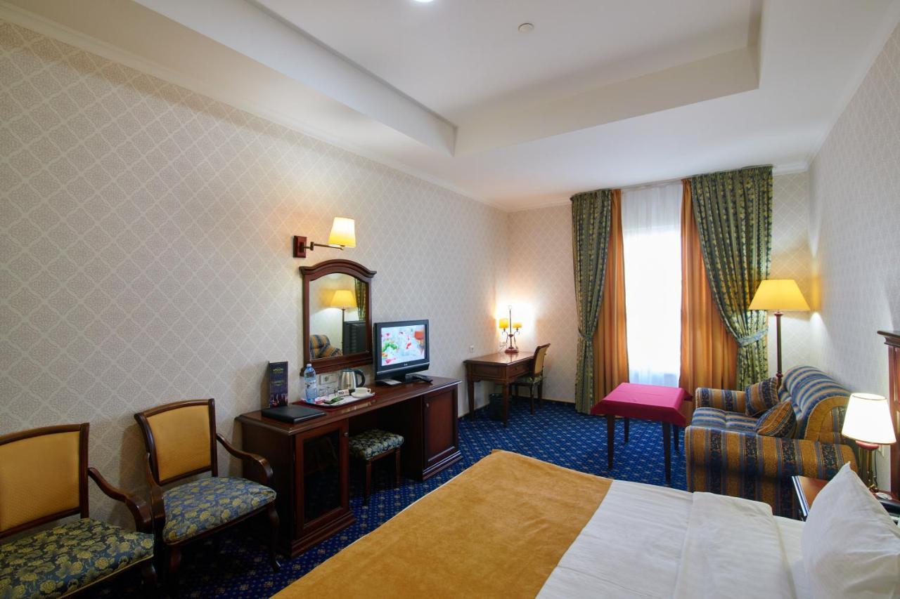 Grand Hotel Victory Aktau  Exterior photo A room at the hotel