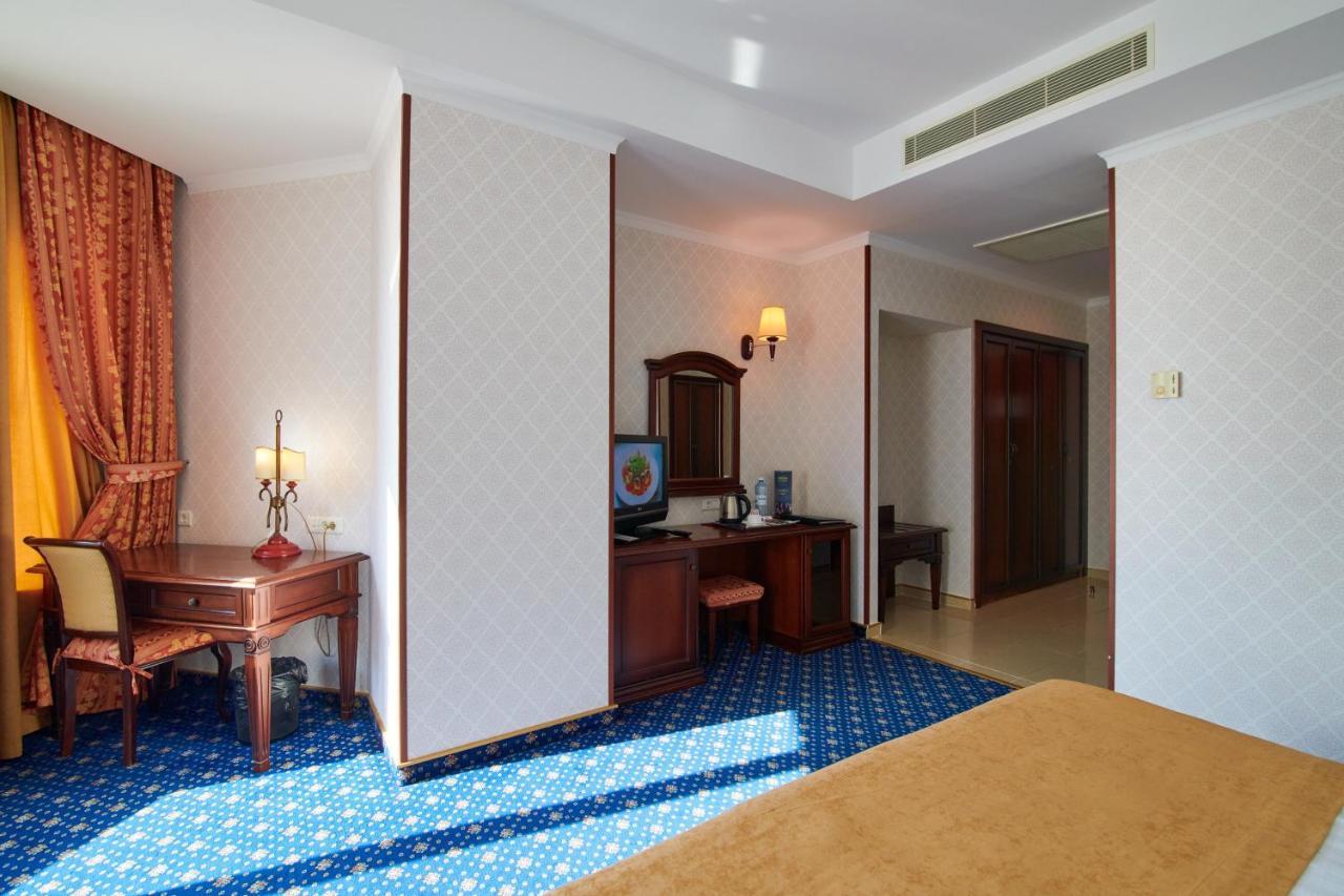 Grand Hotel Victory Aktau  Exterior photo A room at the hotel