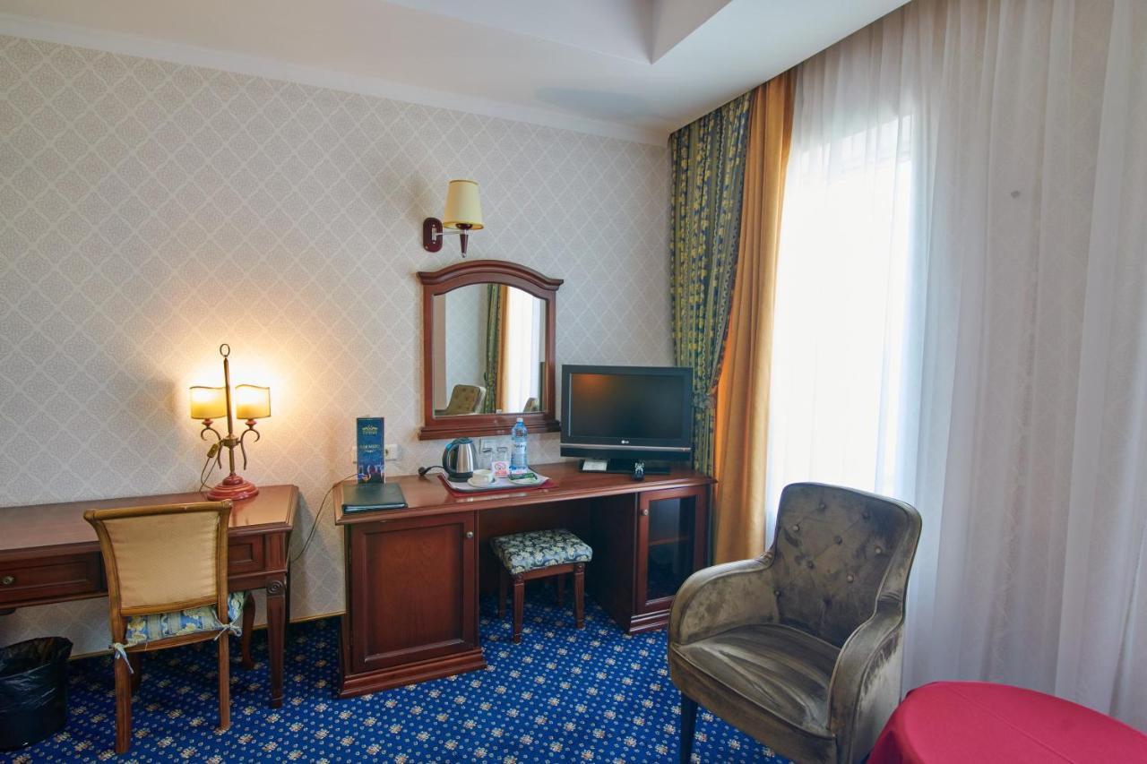 Grand Hotel Victory Aktau  Exterior photo A room at the hotel