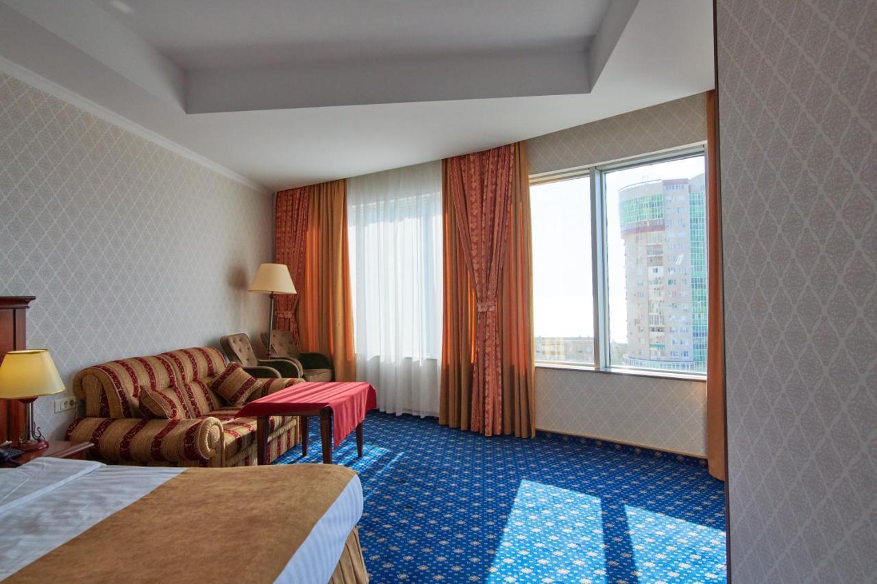 Grand Hotel Victory Aktau  Exterior photo A room at the hotel