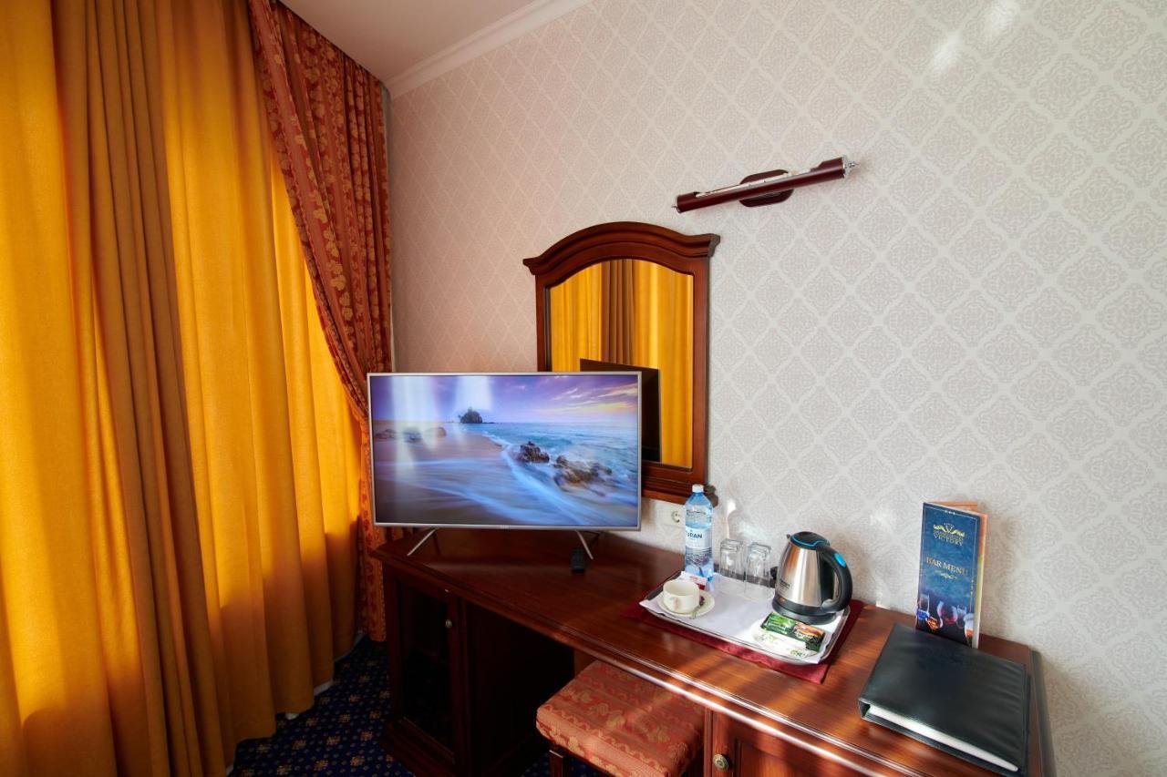 Grand Hotel Victory Aktau  Exterior photo A room at the hotel