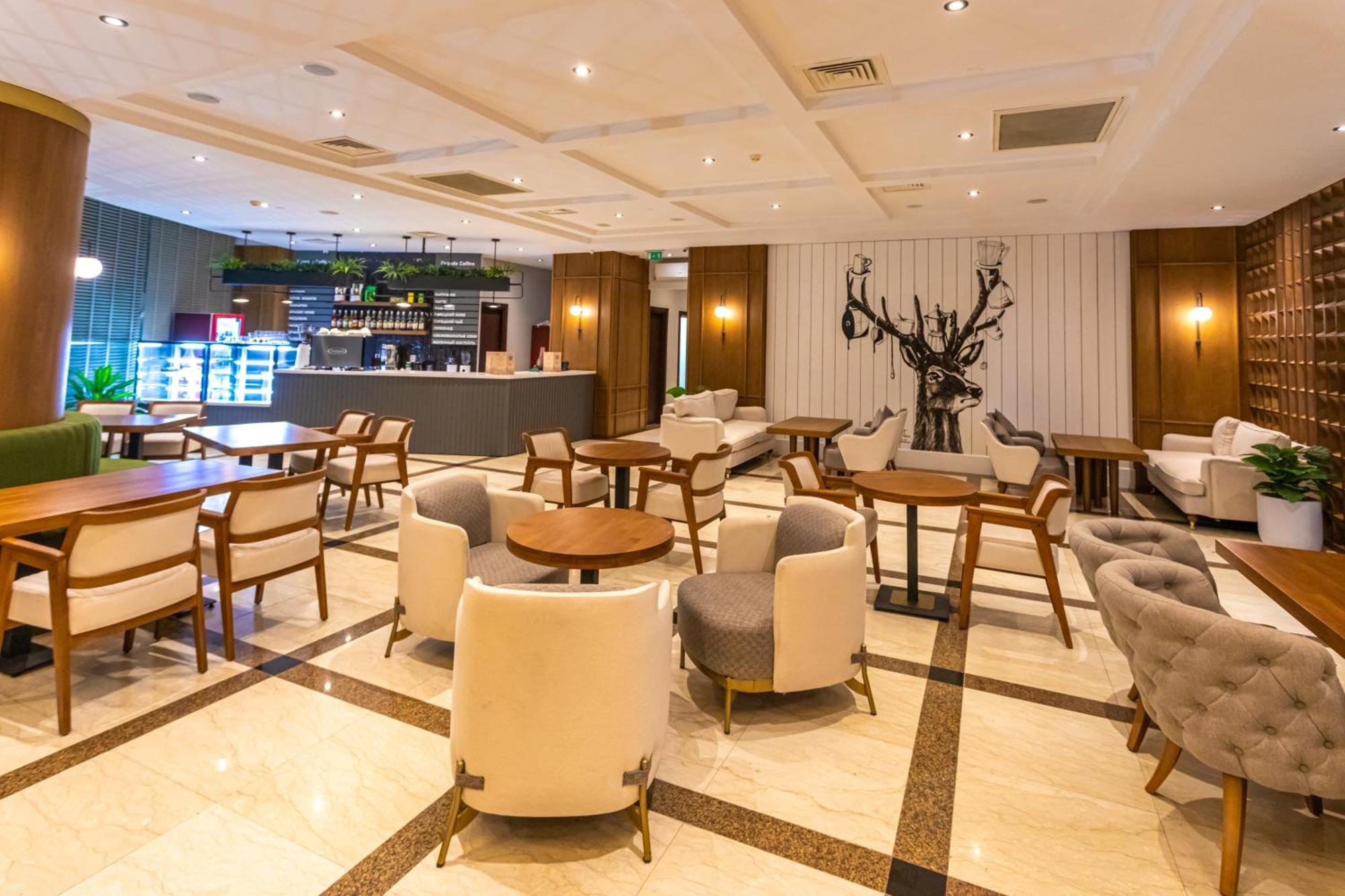 Grand Hotel Victory Aktau  Exterior photo The lounge at the airport