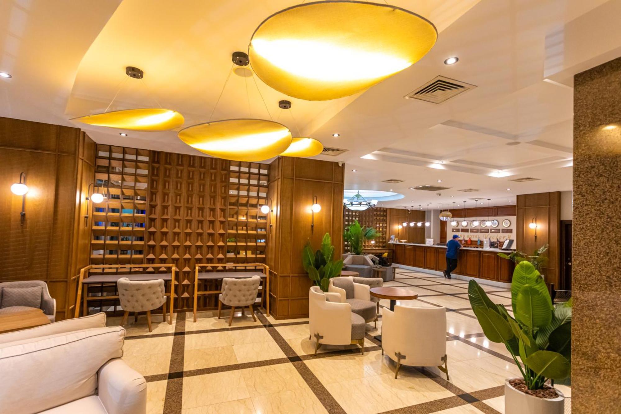 Grand Hotel Victory Aktau  Exterior photo Lobby