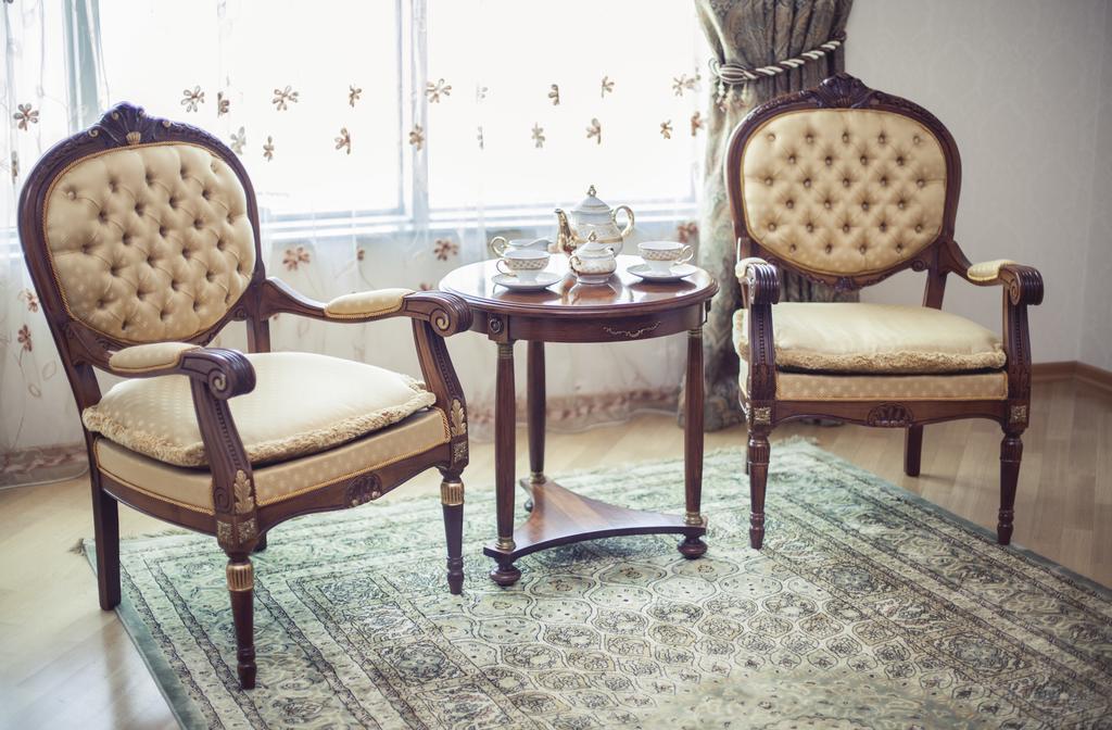 Grand Hotel Victory Aktau  Exterior photo A carpet in a living room